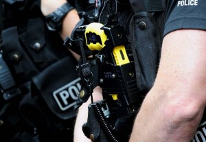File photo dated 19/08/13 of police officers carrying Tasers, as all rank-and-file police officers should be armed with a Taser because of the heightened security threat, the head of the Police Federation has said.